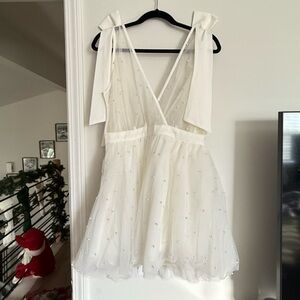 Brand new Karalyn Showpo mini dress with tags